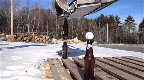 Watch: Local Man Perfects Excavator Beer Bottle Trick 